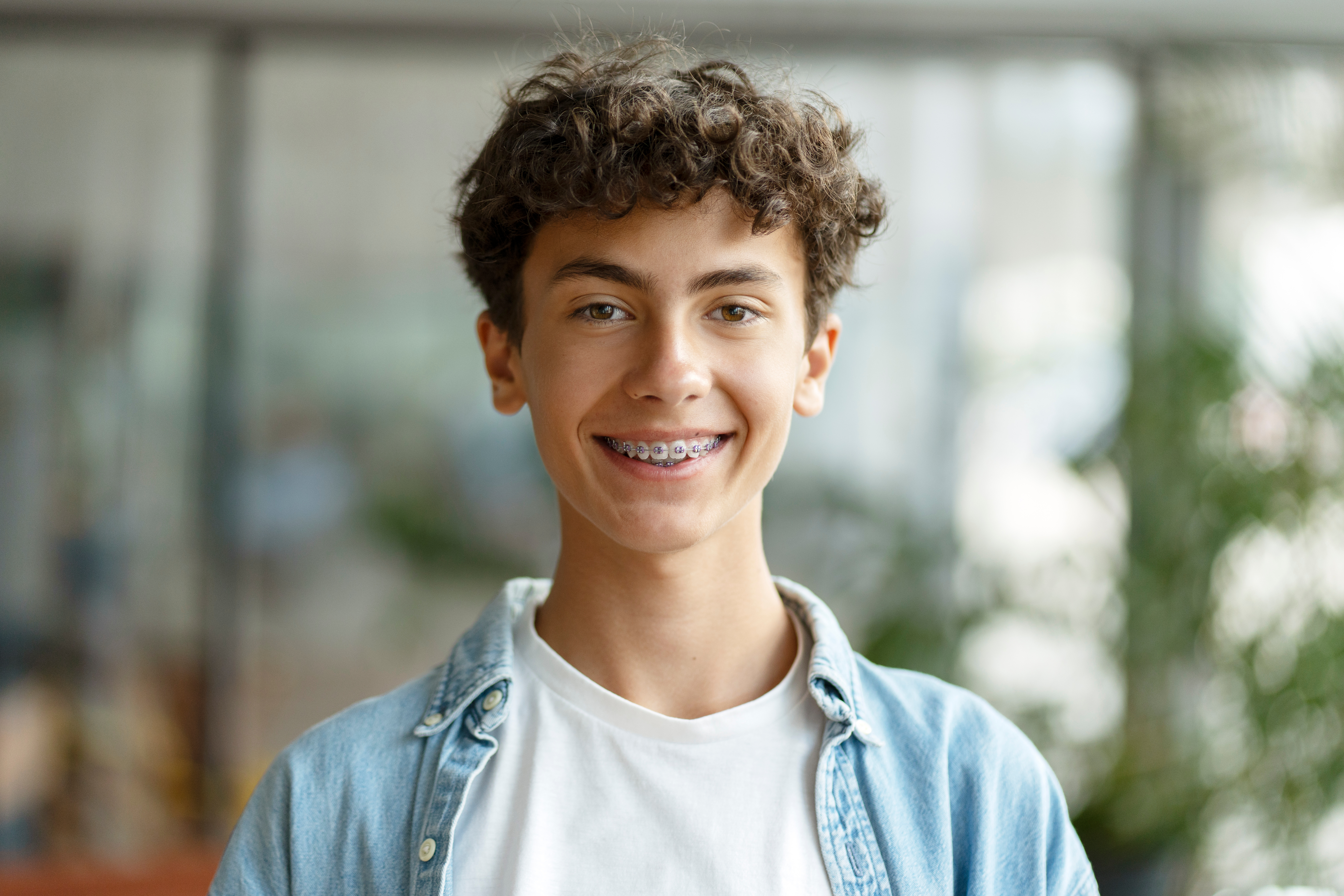 Smiling teen with metal braces